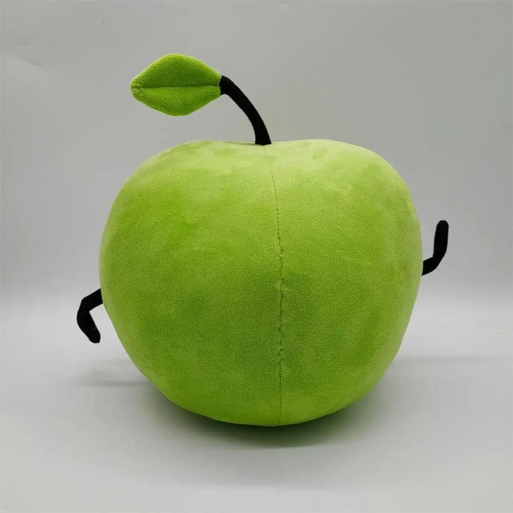 Green Junimo plushie from Stardew Valley displayed at an angle