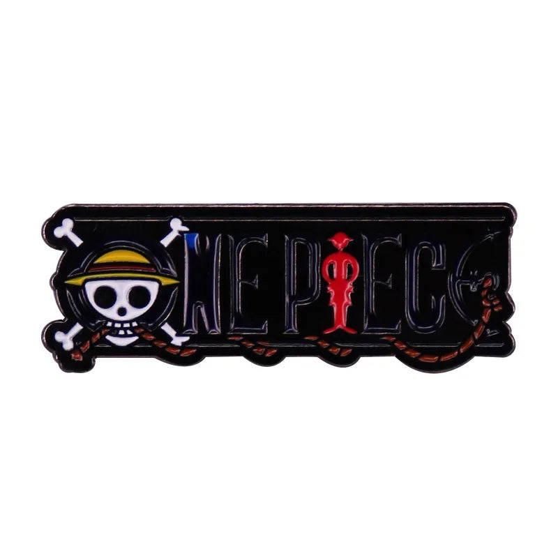 One Piece logo enamel pin with the word "Luffy" and a skull design.