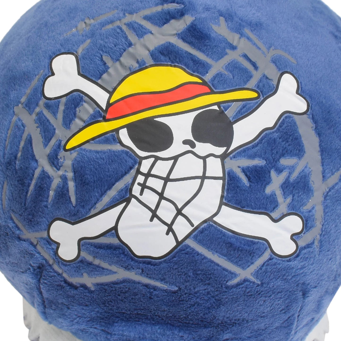 Close-up of the Straw Hat Pirates Jolly Roger emblem stitched onto the plush.