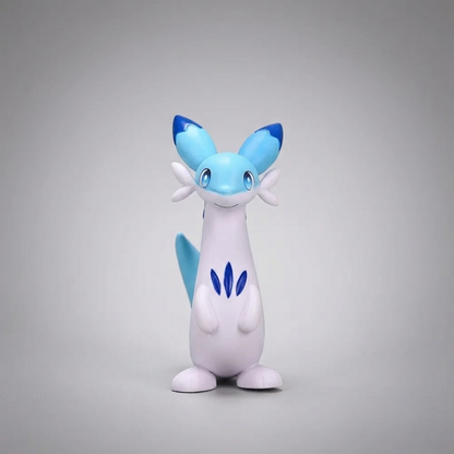 Front-facing blue-and-white Chillet figurine from Palworld, standing upright and smiling against a light gray background.
