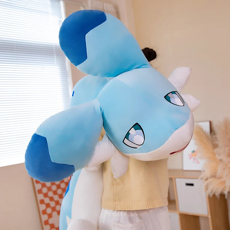 Palworld Chillet giant blue plush being held over a person’s shoulder, showing its oversized head, long ears and embroidered eyes.
