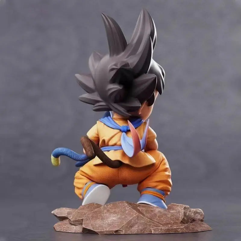 Young Goku and Puer Figurine