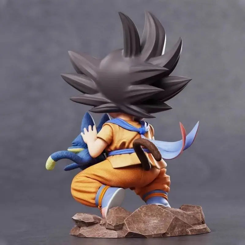 Young Goku and Puer Figurine