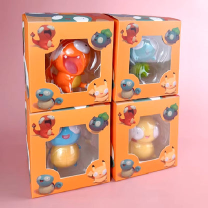 Boxed set of funny Pokémon figurines featuring Charmander, Bulbasaur, Squirtle, and Pikachu, each with derpy expressions, displayed in bright orange packaging with playful character illustrations, perfect for gifting or collecting.