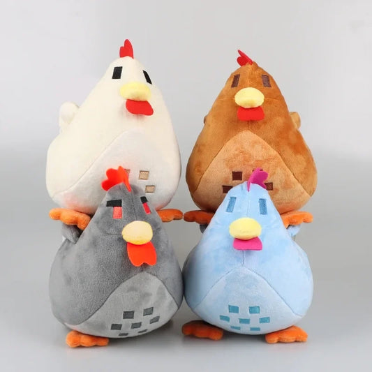 Group of Stardew Valley chicken plushies in various colors, including white, brown, gray, and blue, arranged together.